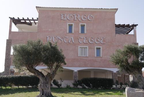 a building with the name boco punaoco at A Punta Tegge il mare la spiaggia il tramonto in La Maddalena