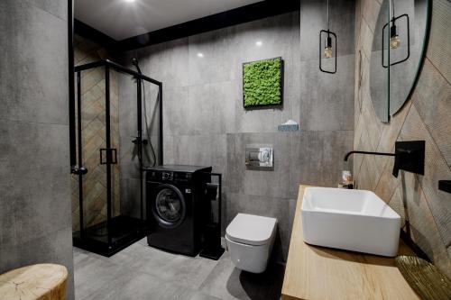 Ένα μπάνιο στο Apartament Aura