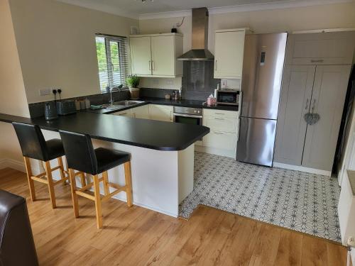Kuchyň nebo kuchyňský kout v ubytování Millstream Cottage House & Apartment
