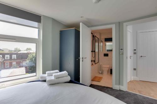 Katil atau katil-katil dalam bilik di New London Life Executive Apartments