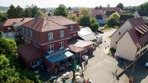 an overhead view of a large building in a town at Cour Du Tonnelier in Bouxwiller