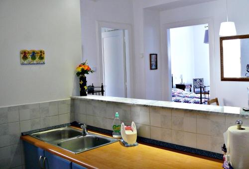 Kuchyň nebo kuchyňský kout v ubytování M&M Apartment