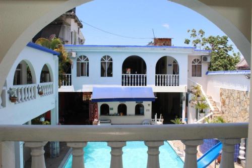 a view of a house from a balcony at Hotel Villa del Rosario Nuevo in Melgar