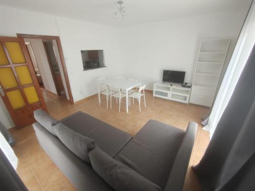 TV a/nebo společenská místnost v ubytování Formentera Suite 5