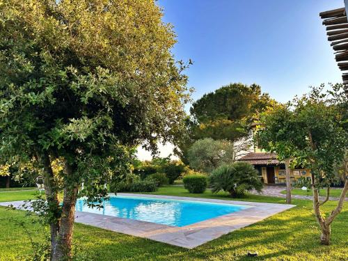 Piscina en o cerca de SU PASSU Country House