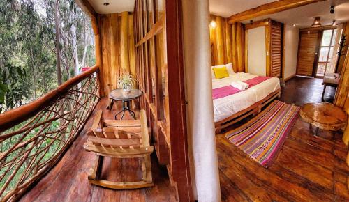 Кровать или кровати в номере Eco Quechua Lodge