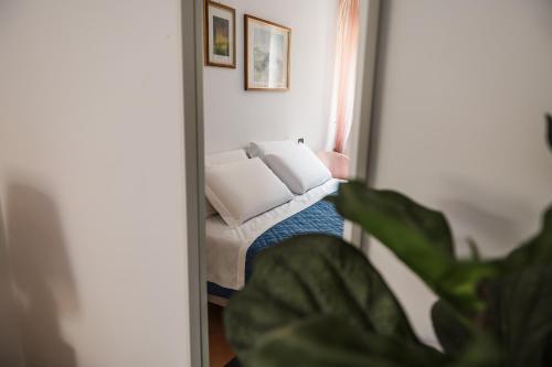 Osimo Caves Roomsにあるベッド