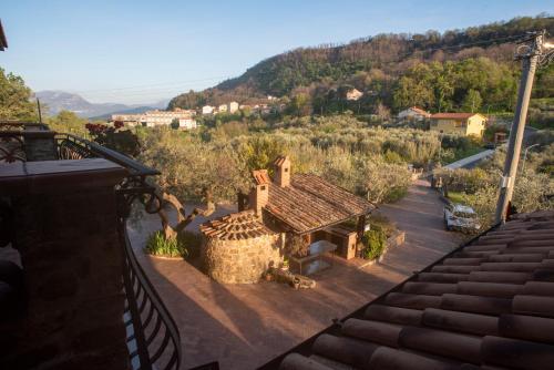 a small house with a view of a mountain at La Ginestra in Castel San Lorenzo