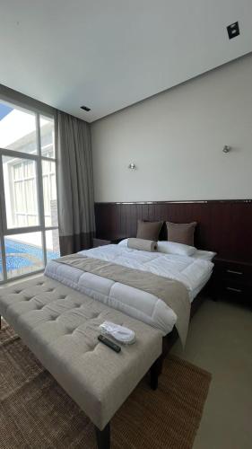 Tempat tidur dalam kamar di Jumeirah chalet