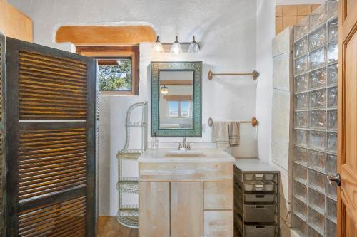 a bathroom with a sink and a mirror at Casa de Luna in Alpine