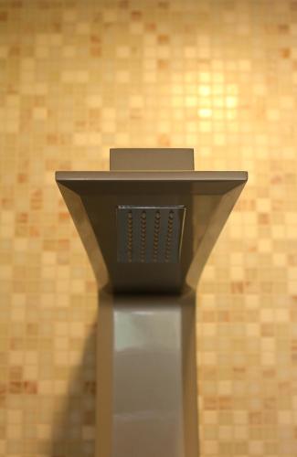 a podium with a laptop on top of it at B&B La Sosta degli Artisti in Pietrasanta
