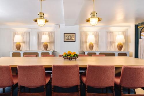 a large dining room with a table and chairs at Palihotel San Diego in San Diego