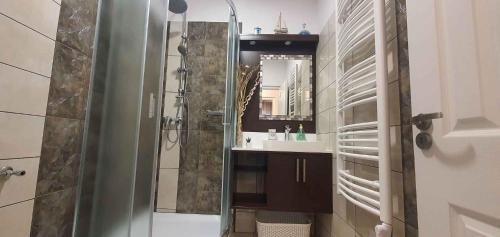 a bathroom with a shower and a sink at Holiday home in Keszthely - Balaton 44883 in Keszthely