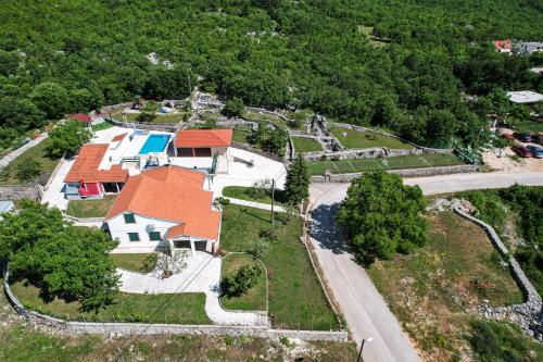 an overhead view of a house with a road at Villa Smajo in Kotlenice
