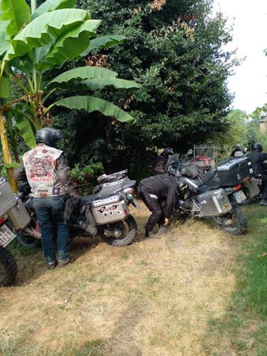 a group of motorcyclists standing next to their motorcycles at Cabernet Tali in Tʼelavi