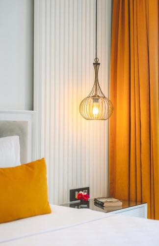 Katil atau katil-katil dalam bilik di Jasmine Otel