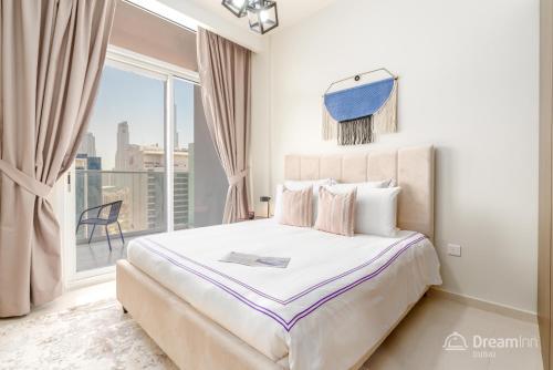 Postel nebo postele na pokoji v ubytování Dream Inn Apartments - Vera Residence Business Bay