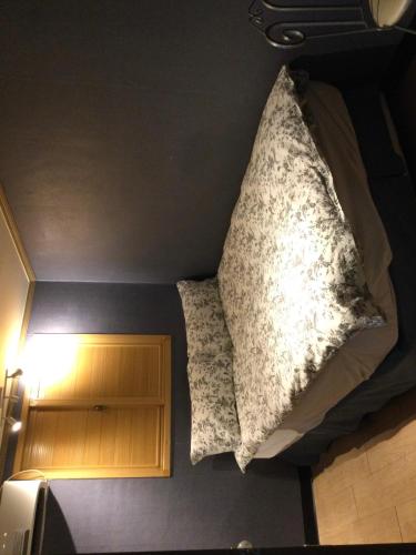 Ένα ή περισσότερα κρεβάτια σε δωμάτιο στο G Mini Hotel Dongdaemun