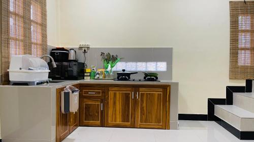 a kitchen with a sink and a counter top at A Luxury Duplex in Dili City, Timor-Leste in Dili