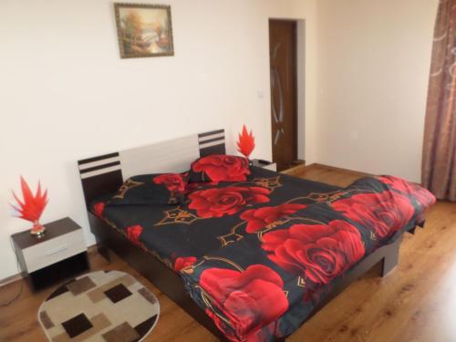 En eller flere senge i et værelse på Casa Montana Busteni