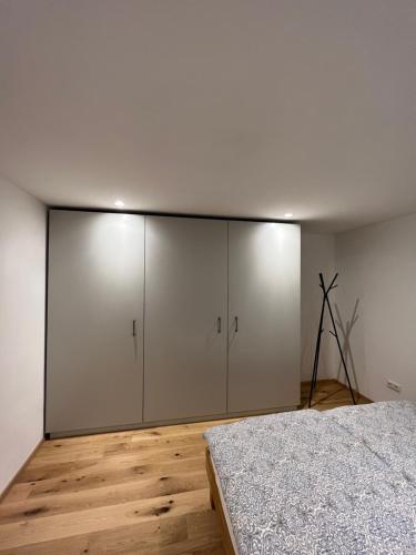 เตียงในห้องที่ Grünberg Apartments
