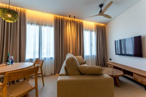Μια τηλεόραση ή/και κέντρο ψυχαγωγίας στο Hotel Apartamentos Hamus