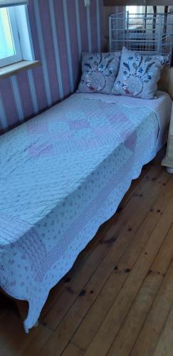 Postel nebo postele na pokoji v ubytování Pühajõe Country House