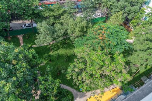 an overhead view of a park with trees and a car at Guangzhou Baiyun Airport Rejoice by Argyle Hotel Rehe Metro Exit B --Free shuttle bus is provided during the 138th Canton Fair in Guangzhou
