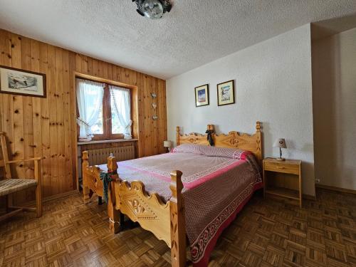 Postel nebo postele na pokoji v ubytování Appartamento panoramico La Chapelle