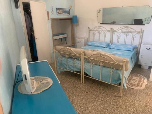 Katil atau katil-katil dalam bilik di Casa Contadina