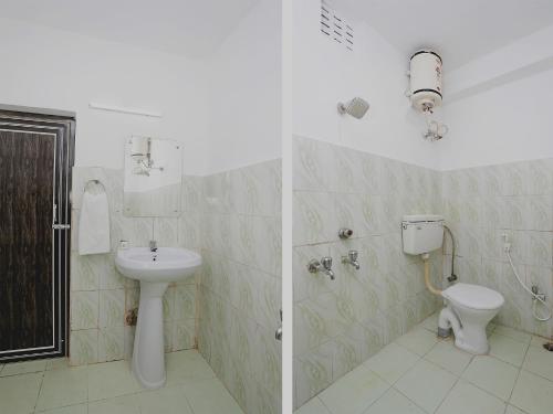a bathroom with a sink and a toilet at FabHotel Sai Sagar Residency in Bhubaneshwar