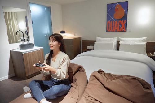 Aank Hotel Busan Nampoにあるベッド