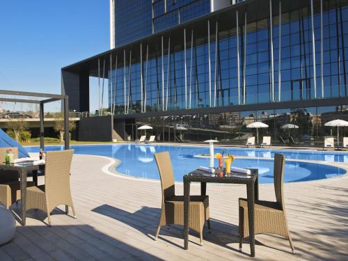 A piscina em ou perto de Melia Braga Hotel & Spa