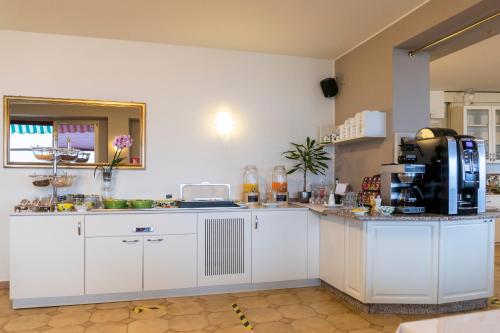 Una cocina o zona de cocina en Hotel Nettuno