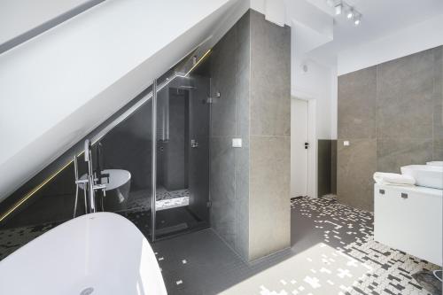 Ванная комната в Penthouse Comfort Apartments Granaria