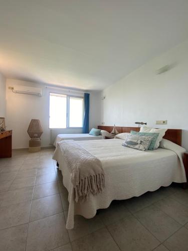 Postel nebo postele na pokoji v ubytování Hostal Blayet