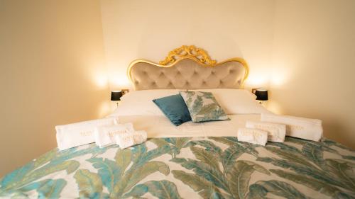 A bed or beds in a room at Sensoria Naxos Suites