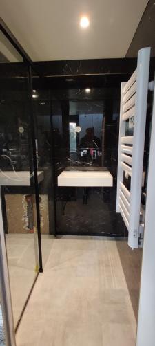 a room with a window with a table in it at Mas des Buscades in Cabris