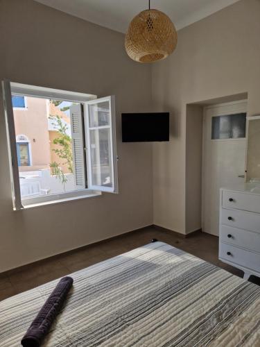 En eller flere senge i et værelse på The Garden House