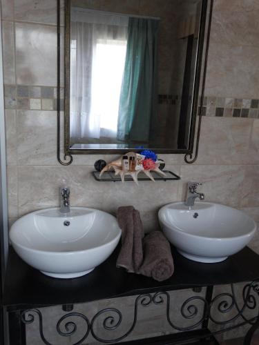 Ένα μπάνιο στο Isle La Breeze Guest House