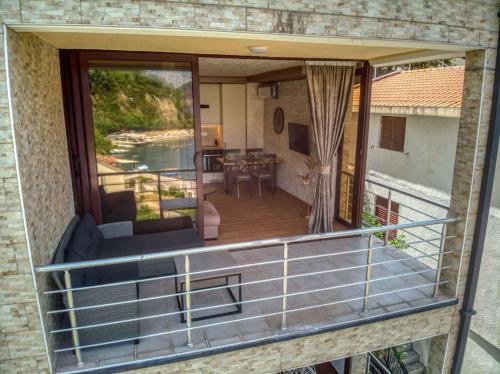 a view from the balcony of a house at Apartmani Nikic -Tivat in Tivat