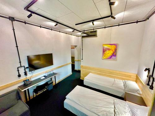 Postel nebo postele na pokoji v ubytování Art Hotel 158