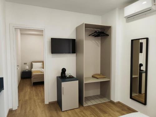 TV o dispositivi per l'intrattenimento presso Rosa Rooms Pompei