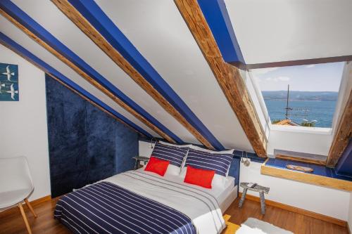 Postel nebo postele na pokoji v ubytování Apartments Porto Duce