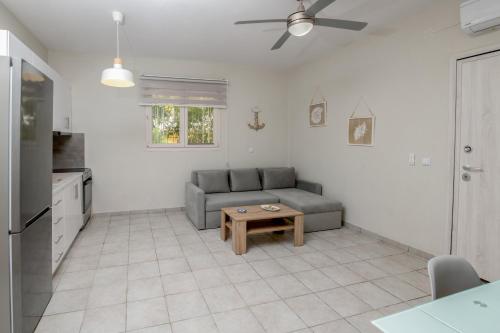 Χώρος καθιστικού στο N&J Apartment 2 by Booking Kottas