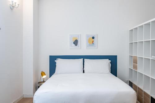 Ένα ή περισσότερα κρεβάτια σε δωμάτιο στο RELSTAY - Porta Romana - Large Studio