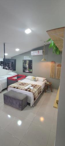 a bedroom with two beds in a room at Residencial Temporada Aracaju in Aracaju