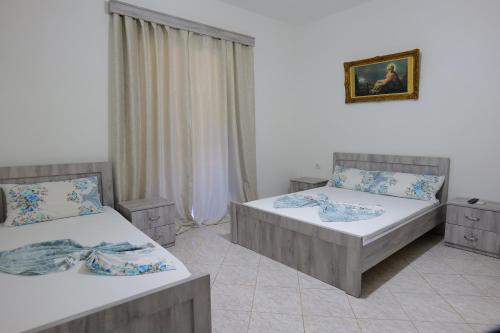 Una cama o camas en una habitación de Hotel Panorama Piqeras