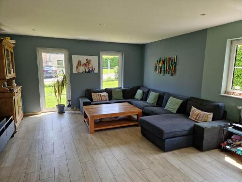 Χώρος καθιστικού στο Petite chambre près du circuit