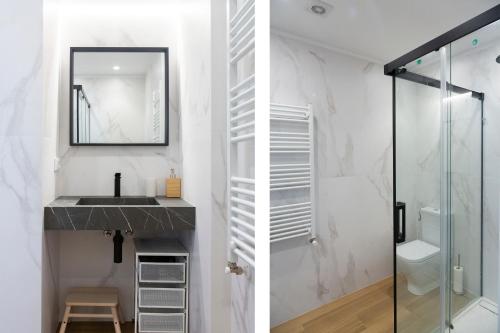 a bathroom with a sink and a shower at El Retiro de San Francisco - Piso de diseño - 4-5 plazas in Oviedo